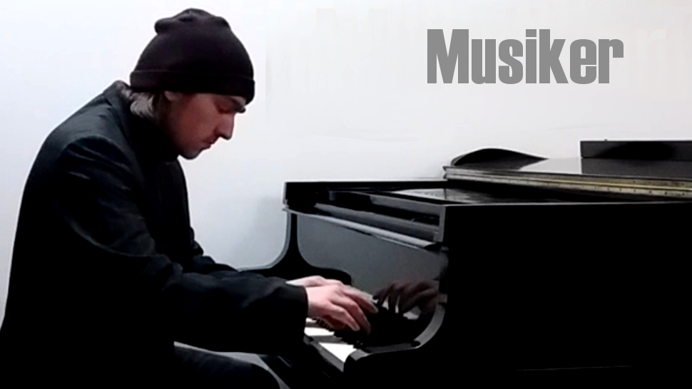 Dustin Leitol playing piano on bechstein piano in Ahrensburger Klaviergalerie